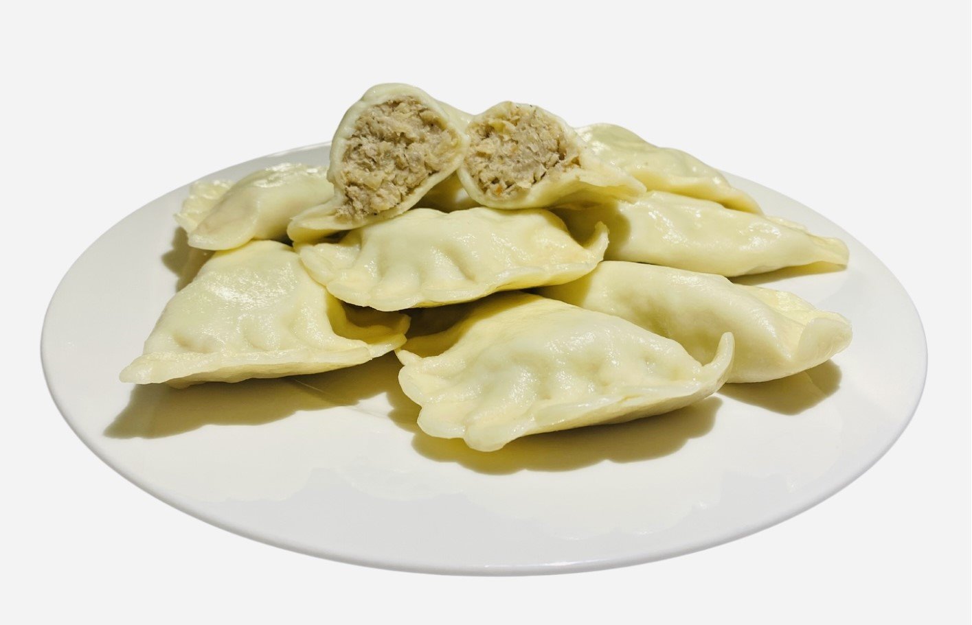 WESOŁA RODZINKA Pierogi 1kg z kapustą i mięsem /4/