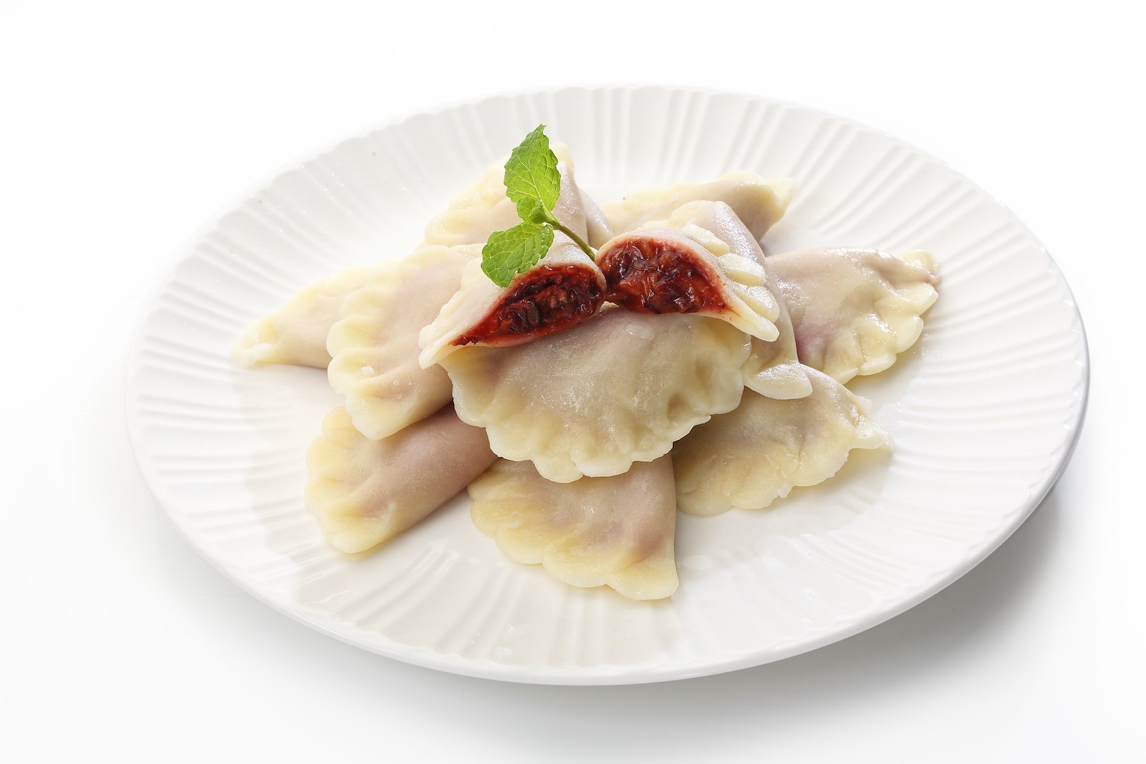 WESOŁA RODZINKA Pierogi 1kg ze śliwkami /4/